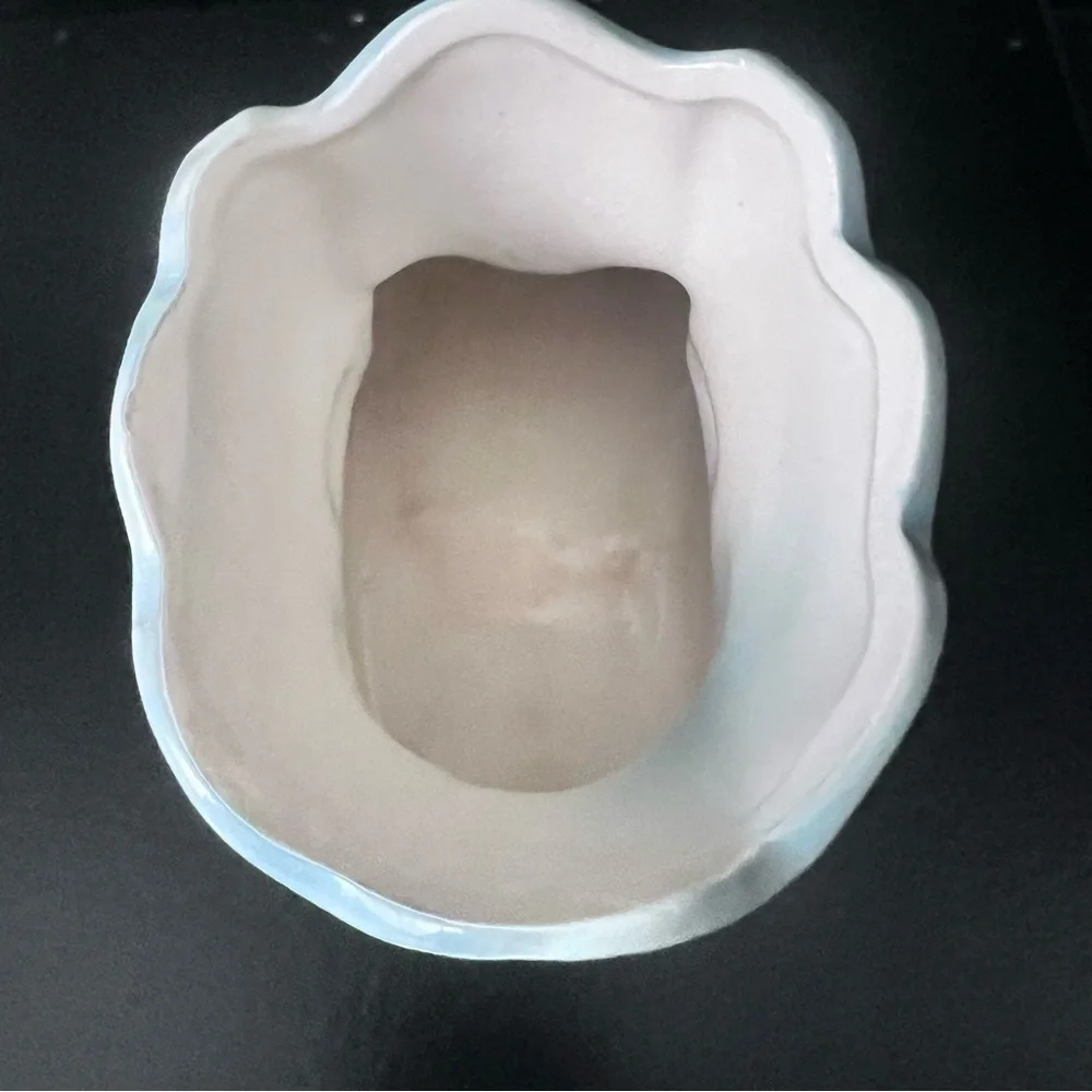 Vintage ceramic baby bootie vase